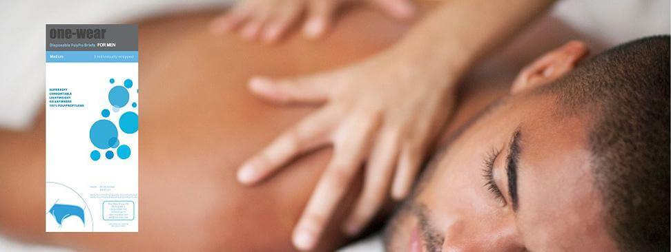 Man receiving a spa and massage while wearing disposable briers